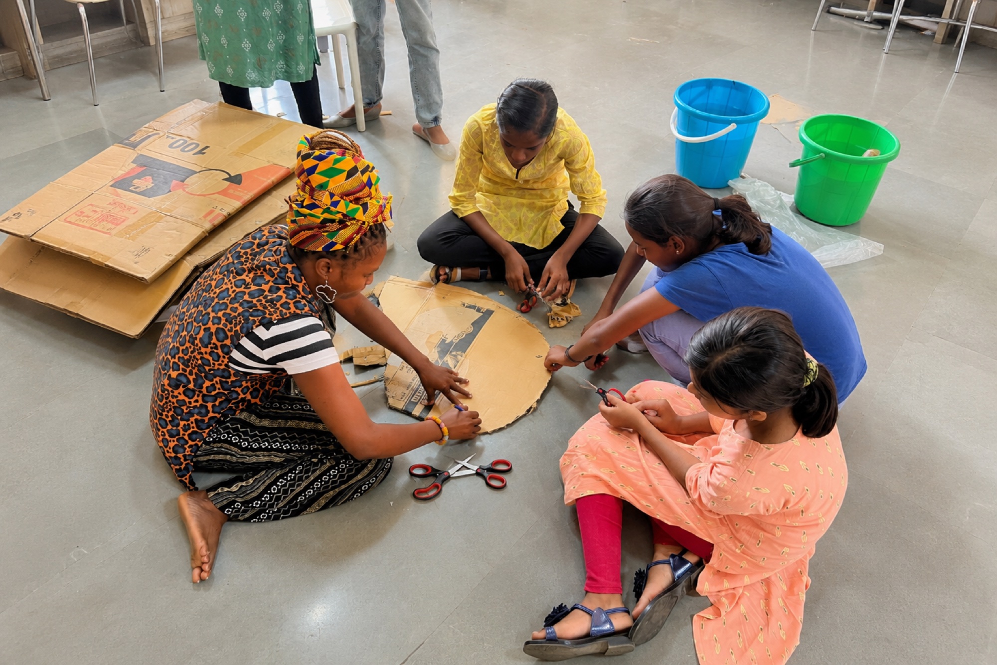 Sing for Hope students working together on a collaborative art piece